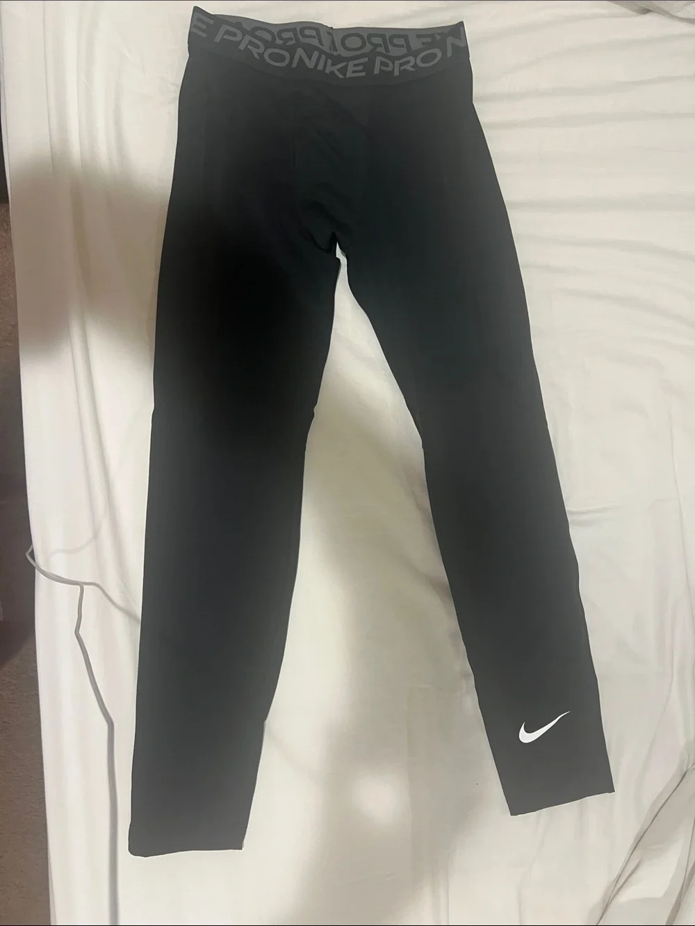 Nike Kids Black Leggings with White Swoosh